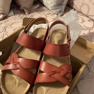 Never worn. Still in the box.